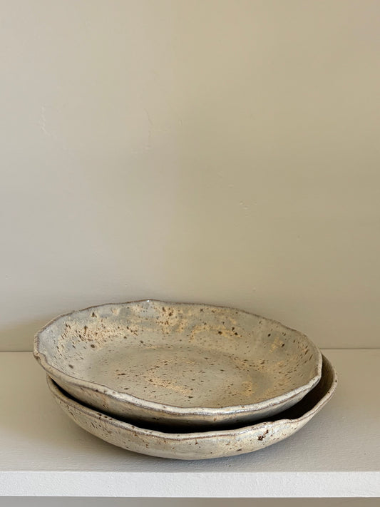 asymmetrical pasta bowl in speckled beige glaze