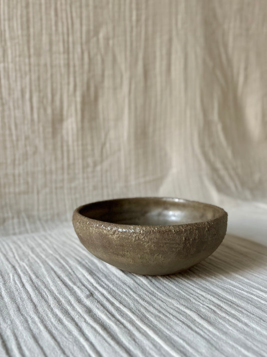 Textured bowl in brown glaze