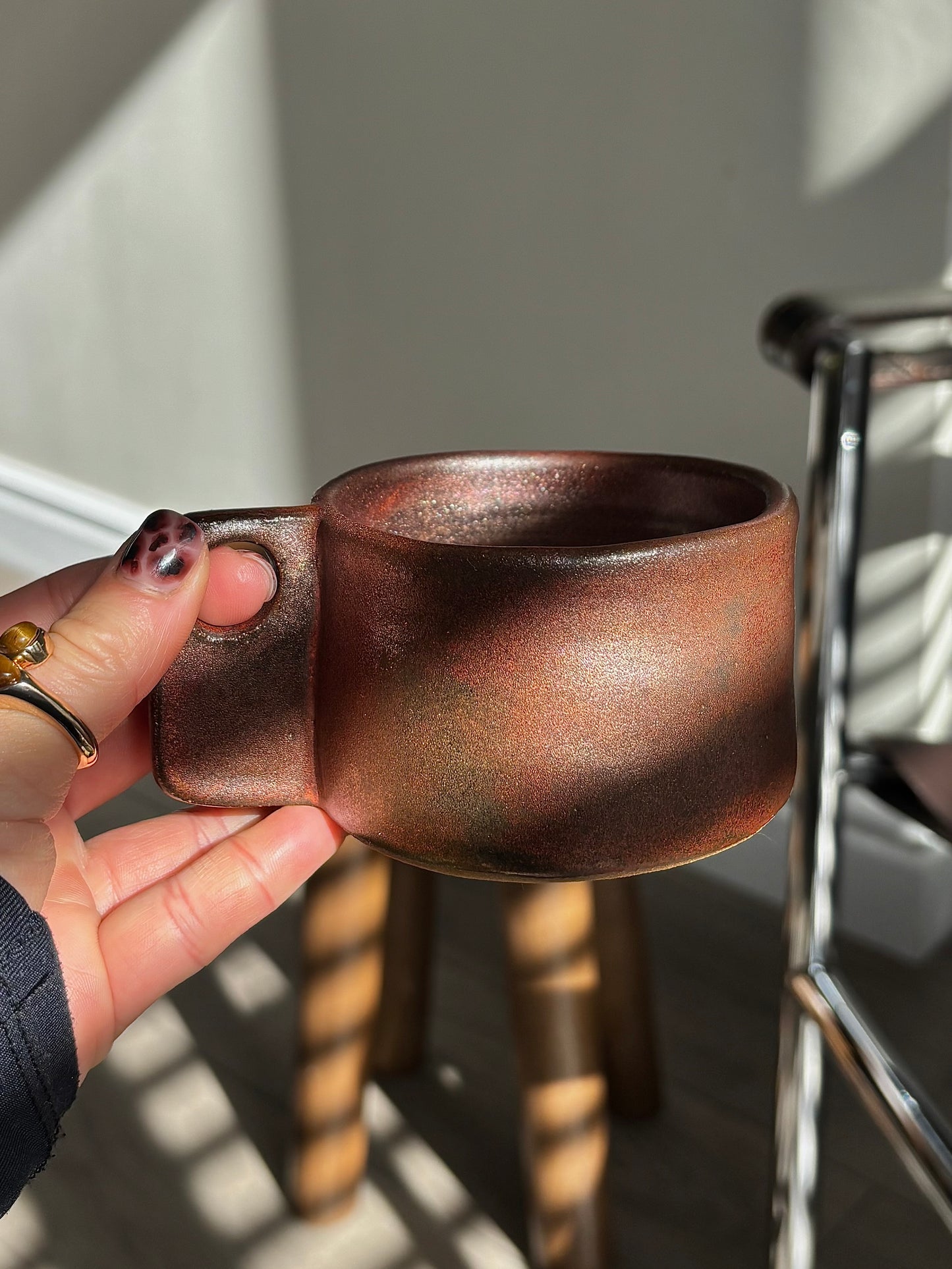 small cup in copper glaze