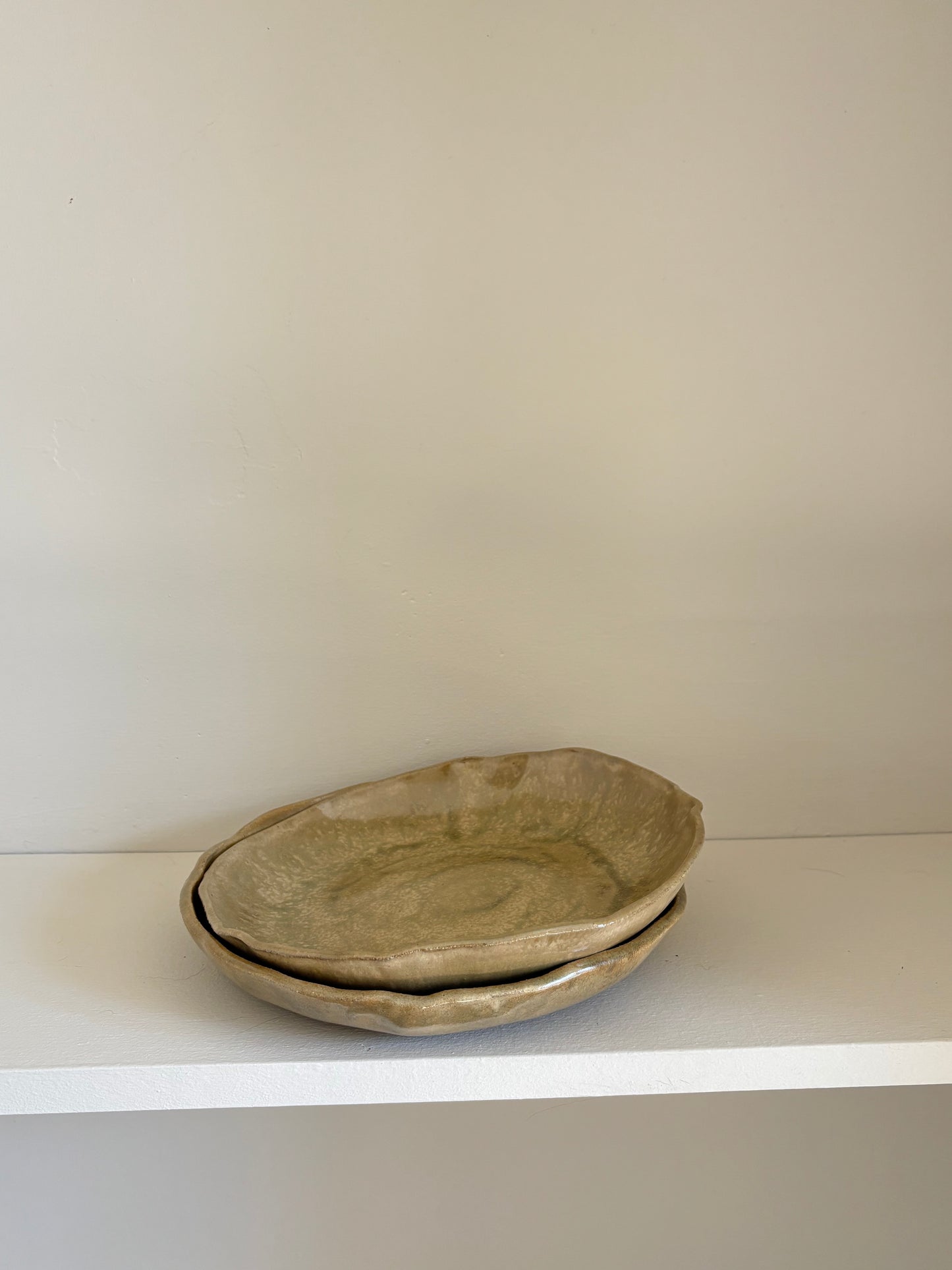 asymmetrical pasta bowl in green/beige glaze