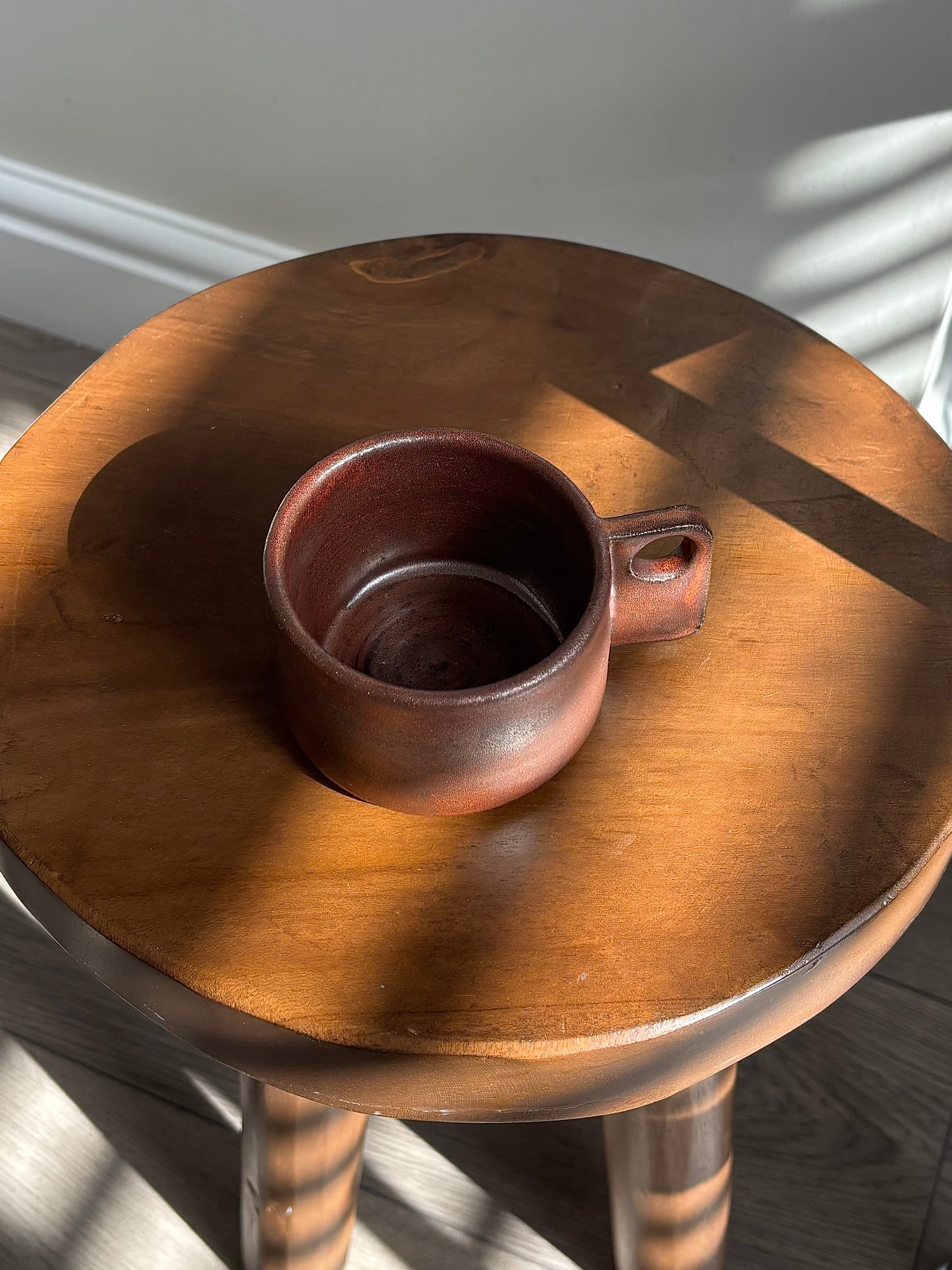 small cup in copper glaze