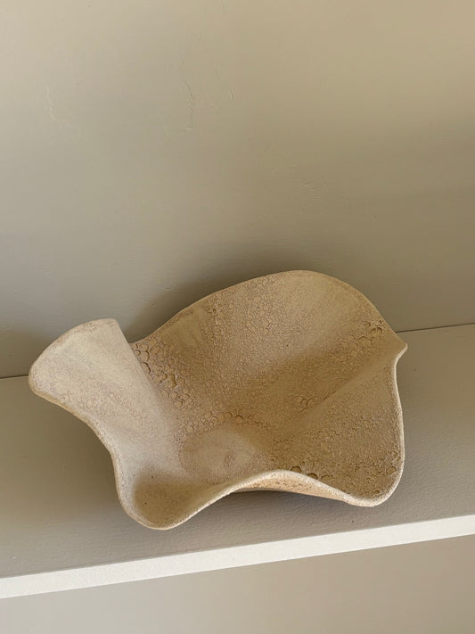 Decorative sculpture in textured stone glaze