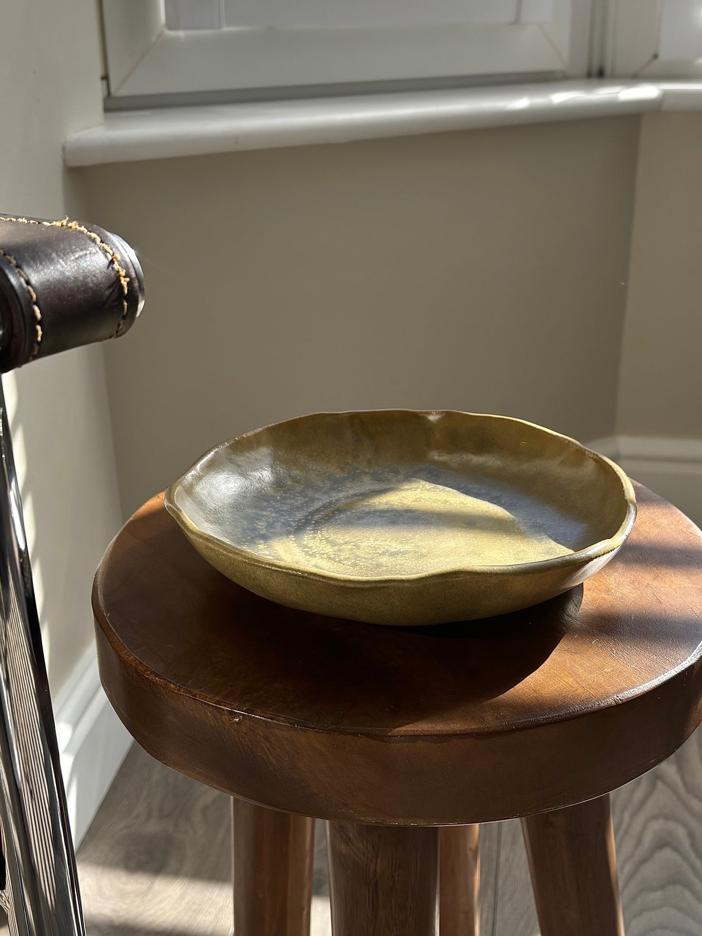 asymmetrical pasta bowl in green/beige glaze
